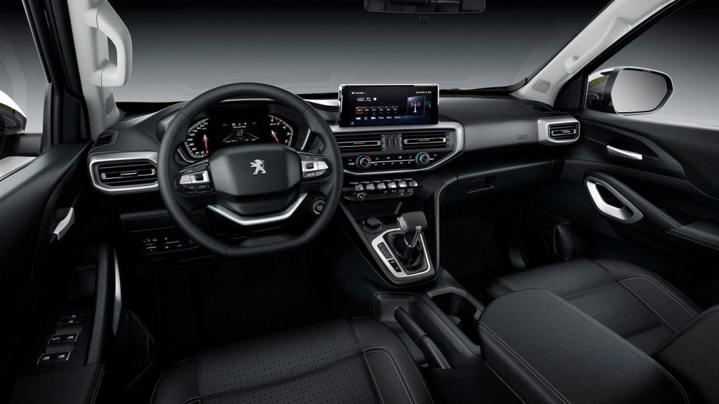 Inspired by its road cars, the Peugeot Landtrek pickup has a modern interior.