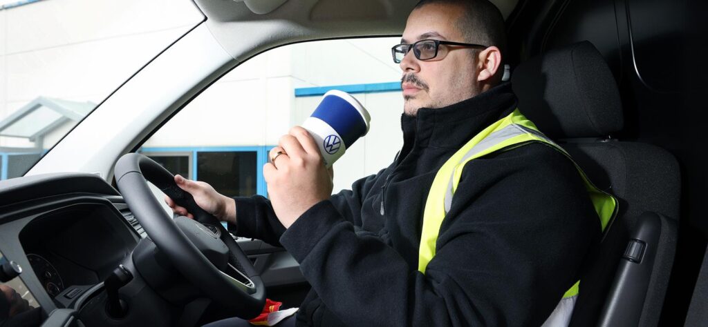 Van drivers drink coffee ahead of tea
