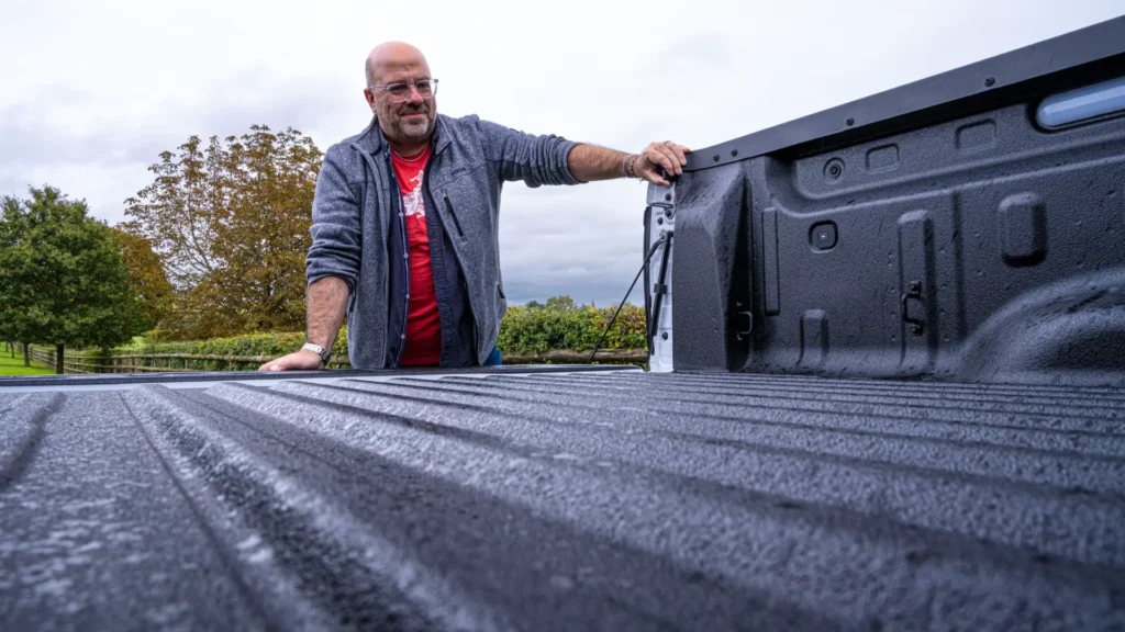 Phil Huff checking out the load bed of the BYD Shark pickup